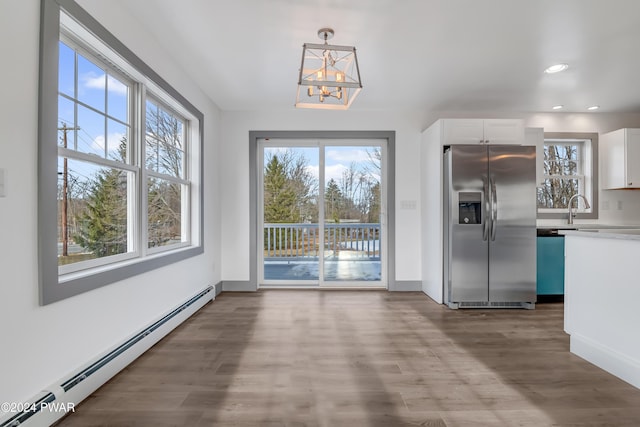 5 Lakeville Ct, Lakeville, PA 18438 - unfurnished dining area featuring a baseboard heating unit, healthy amount of natural light, a chandelier, recessed lighting, and wood finished floors