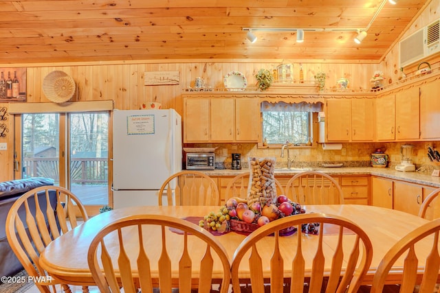 24 Lakeside Dr, Lakeville, PA 18438 - kitchen with a sink, light brown cabinetry, track lighting, and freestanding refrigerator