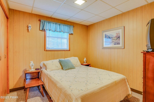 24 Lakeside Dr, Lakeville, PA 18438 - bedroom featuring baseboards, wood walls, carpet flooring, and a drop ceiling