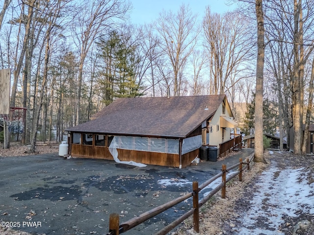 24 Lakeside Dr, Lakeville, PA 18438 - view of home's exterior with roof with shingles