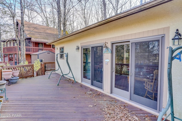 24 Lakeside Dr, Lakeville, PA 18438 - deck with a shed and an outbuilding