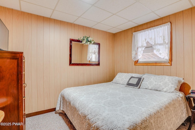 24 Lakeside Dr, Lakeville, PA 18438 - carpeted bedroom featuring wooden walls and a drop ceiling