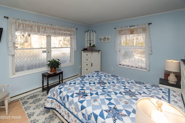 bedroom featuring multiple windows, wood-type flooring, and crown molding