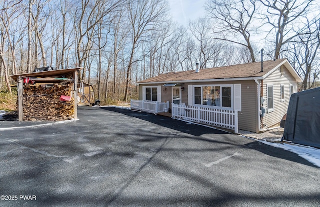 view of front of property with a carport