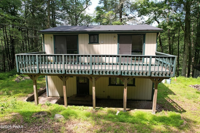 219 Woodpecker Ct, Bushkill, PA 18324 - rear view of house with a wooden deck