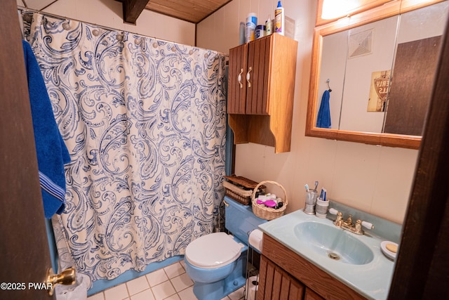 bathroom featuring visible vents, toilet, vanity, and tile patterned flooring