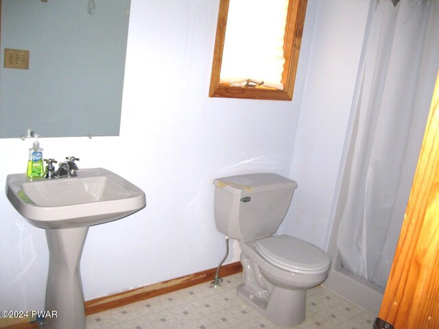 bathroom featuring toilet