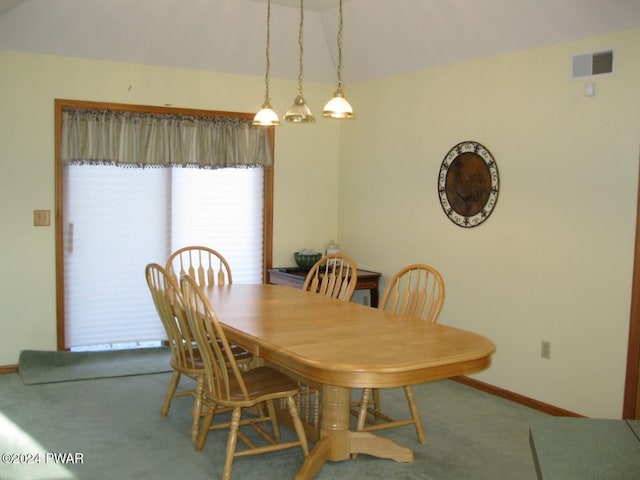 view of carpeted dining area