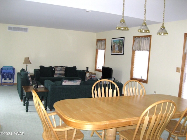 dining room featuring carpet floors