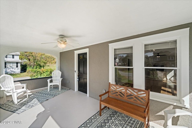 view of patio with ceiling fan