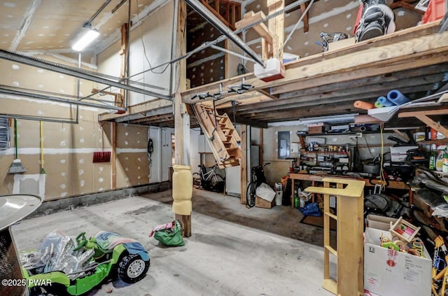 basement featuring electric panel