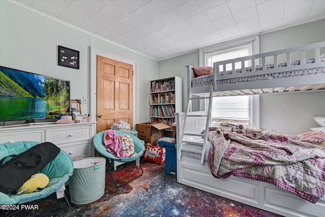 bedroom with ornamental molding