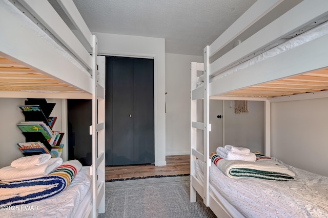 bedroom featuring a textured ceiling