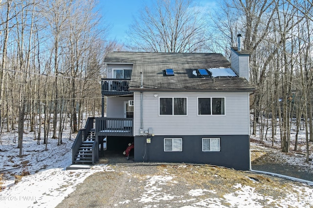 view of front of home with a wooden deck