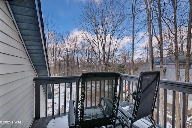 view of snow covered deck