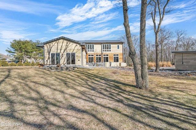 122 Overlook Ln, Lords Valley, PA 18428 - back of house featuring a yard and metal roof