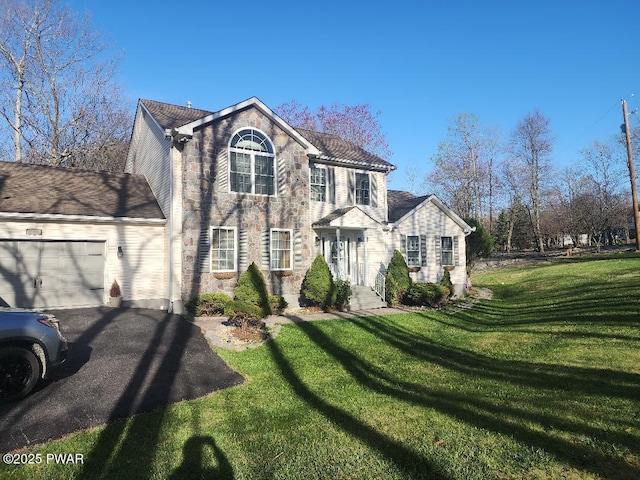 814 Clearview Dr, Long Pond, PA 18334 - colonial inspired home with a garage, a front lawn, driveway, and stone siding