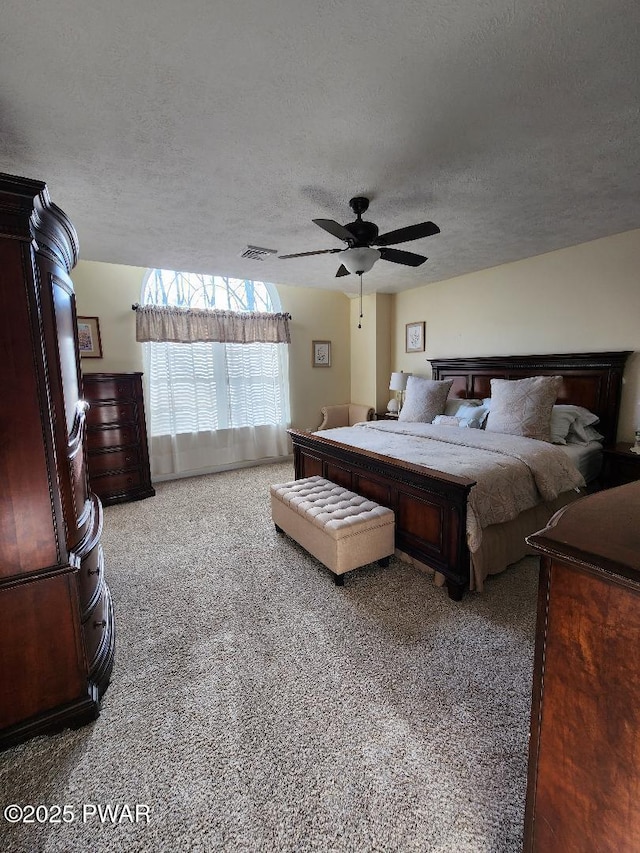 814 Clearview Dr, Long Pond, PA 18334 - bedroom with carpet floors, ceiling fan, a textured ceiling, and visible vents