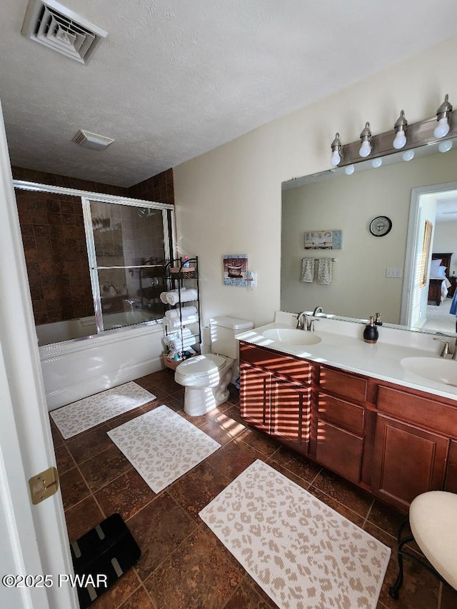 814 Clearview Dr, Long Pond, PA 18334 - full bathroom with double vanity, toilet, visible vents, and a sink
