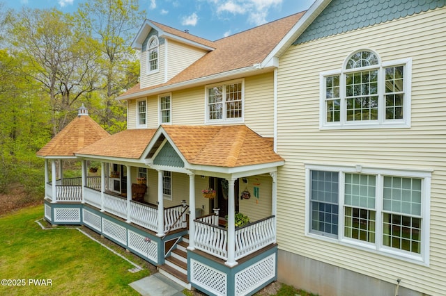 302 Oneida Way, Milford, PA 18337 - view of front of house featuring covered porch, a front lawn, and roof with shingles