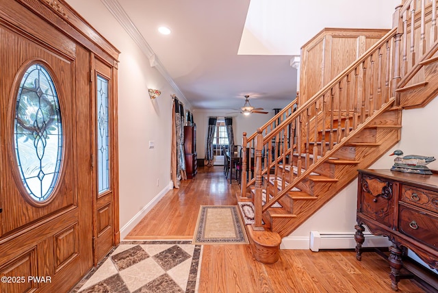 302 Oneida Way, Milford, PA 18337 - entryway with stairway, ornamental molding, light wood-type flooring, baseboards, and ceiling fan