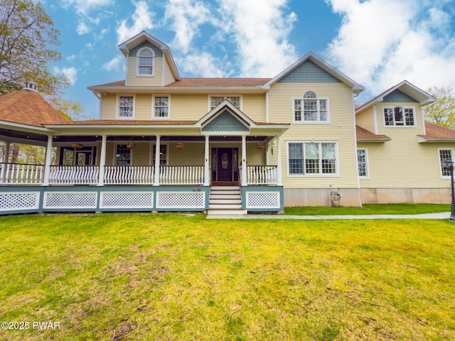 302 Oneida Way, Milford, PA 18337 - victorian home featuring a front lawn, a porch, and roof with shingles