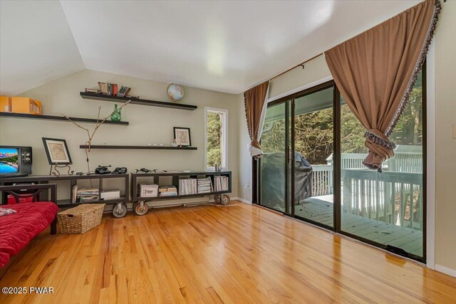 115 Washington Dr, Lords Valley, PA 18428 - living room with wood finished floors and lofted ceiling