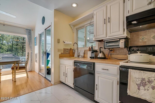 115 Washington Dr, Lords Valley, PA 18428 - kitchen featuring black appliances, light countertops, white cabinets, backsplash, and recessed lighting