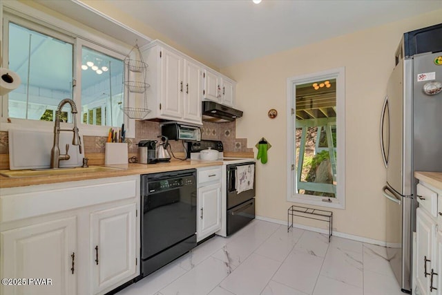 115 Washington Dr, Lords Valley, PA 18428 - kitchen featuring black appliances, under cabinet range hood, white cabinets, light countertops, and decorative backsplash