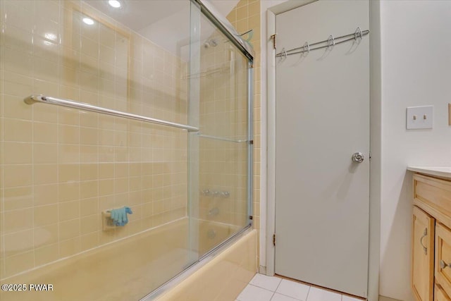 115 Washington Dr, Lords Valley, PA 18428 - bathroom featuring enclosed tub / shower combo, vanity, and tile patterned flooring