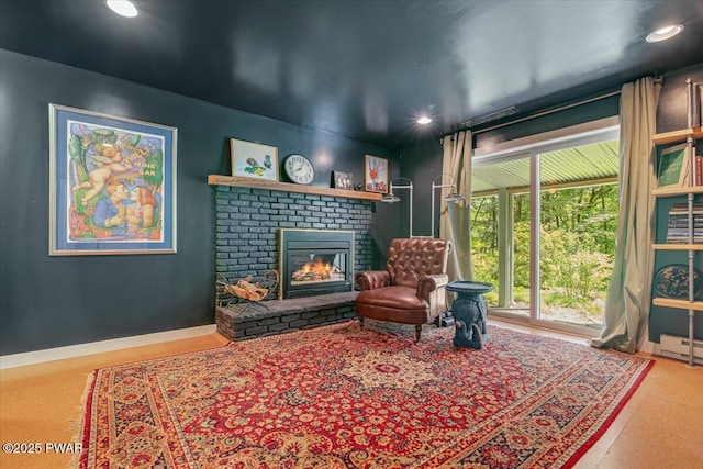 115 Washington Dr, Lords Valley, PA 18428 - sitting room with a brick fireplace and recessed lighting