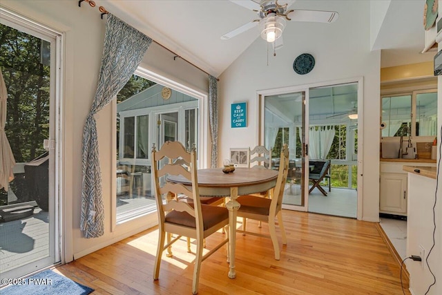 115 Washington Dr, Lords Valley, PA 18428 - dining space with ceiling fan, light wood-style flooring, vaulted ceiling, and plenty of natural light