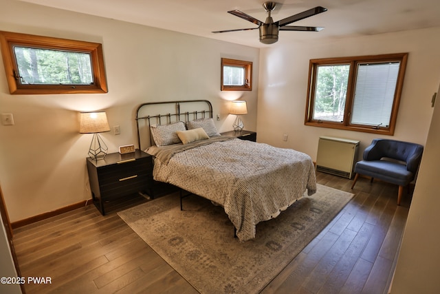 216 Canterbrook Dr, Lords Valley, PA 18328 - bedroom featuring multiple windows, dark wood-type flooring, and ceiling fan