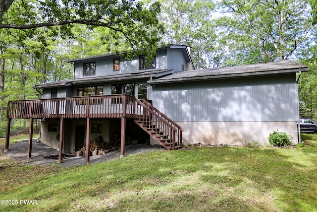 216 Canterbrook Dr, Lords Valley, PA 18328 - rear view of house with a wooden deck, a yard, and stairway