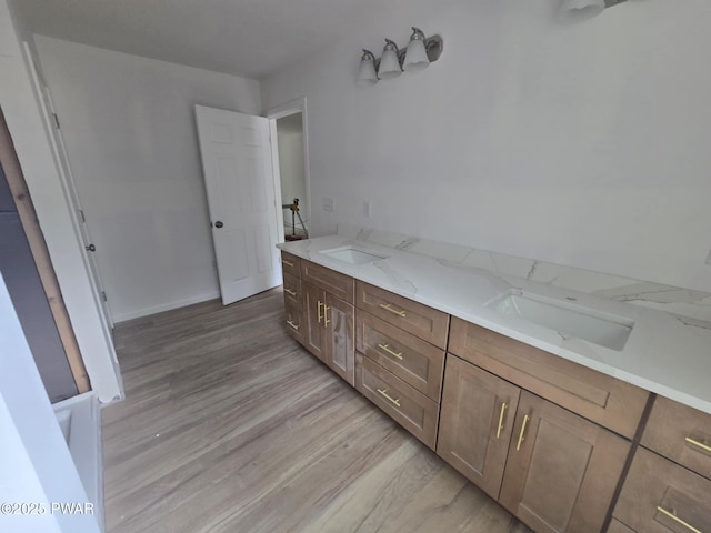 72 Lakeview Dr, Lake Ariel, PA 18436 - bathroom with wood finished floors and double vanity
