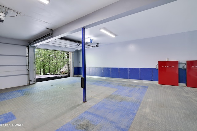2766 Owego Tpke, Hawley, PA 18428 - garage featuring a garage door opener