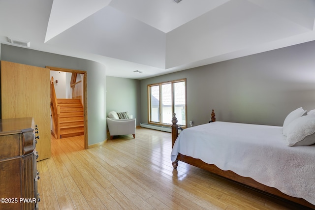 2766 Owego Tpke, Hawley, PA 18428 - bedroom with a baseboard radiator and light wood finished floors