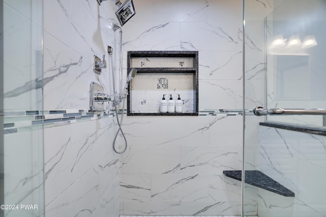 bathroom featuring an enclosed shower