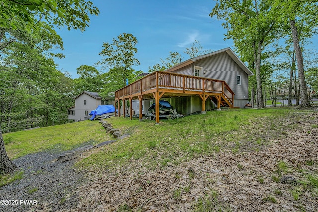 1011 Salem Pl, Lake Ariel, PA 18436 - back of property with a deck, stairs, and a yard