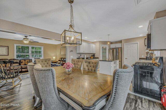 1011 Salem Pl, Lake Ariel, PA 18436 - dining room featuring ceiling fan, light wood finished floors, recessed lighting, and a chandelier