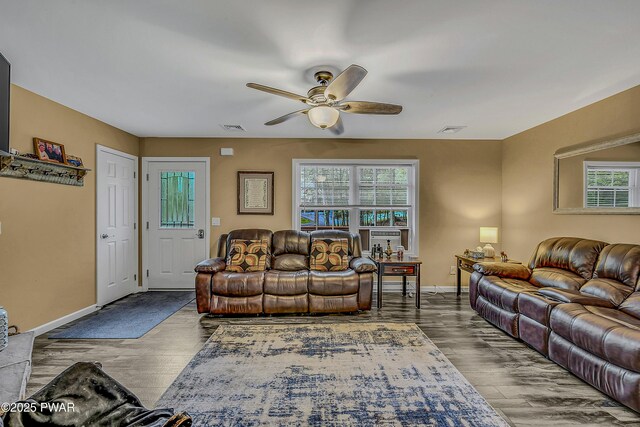 1011 Salem Pl, Lake Ariel, PA 18436 - living room featuring plenty of natural light, ceiling fan, wood finished floors, and baseboards