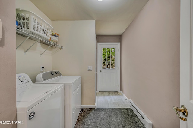 1011 Salem Pl, Lake Ariel, PA 18436 - laundry area featuring a baseboard radiator, washing machine and dryer, light colored carpet, and baseboards
