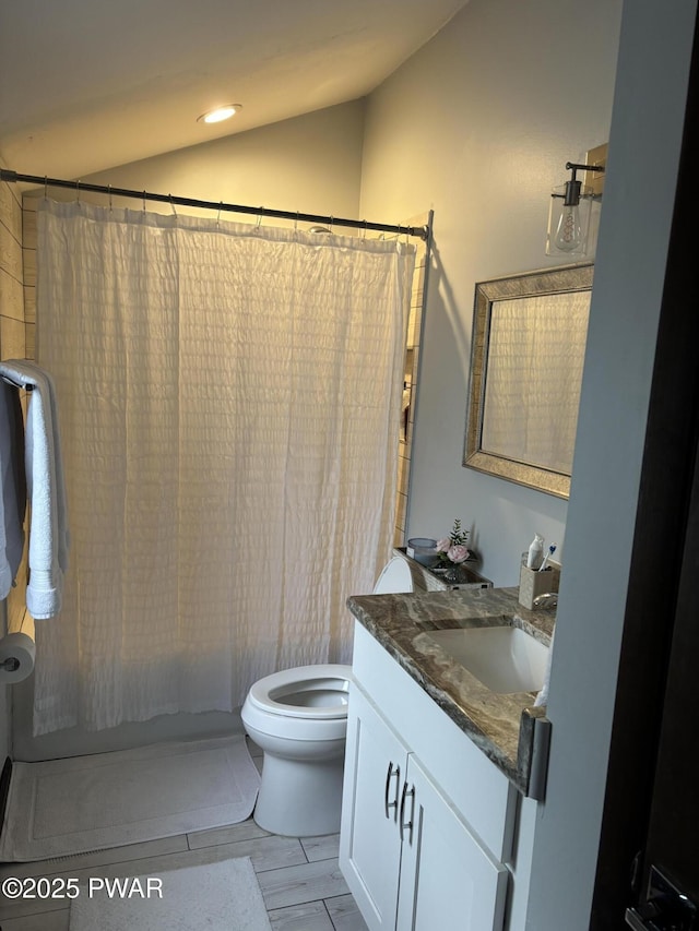 1267 Brookfield Rd, Lake Ariel, PA 18436 - bathroom with vanity, lofted ceiling, shower / bath combo, and recessed lighting