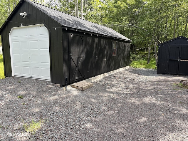 1267 Brookfield Rd, Lake Ariel, PA 18436 - detached garage featuring a storage shed
