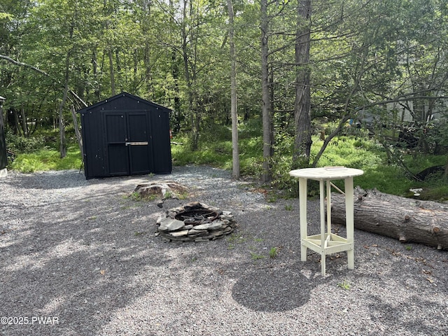 1267 Brookfield Rd, Lake Ariel, PA 18436 - view of yard with an outdoor fire pit and a storage shed
