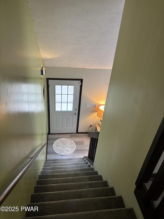 1267 Brookfield Rd, Lake Ariel, PA 18436 - stairs with wood finished floors and a textured ceiling