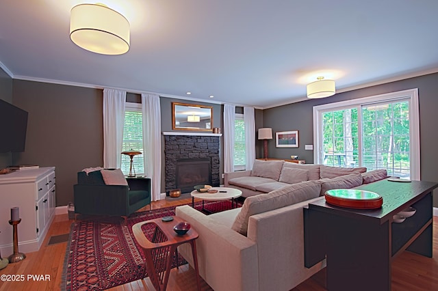 401 Log Tavern Rd, Milford, PA 18337 - living area with light wood finished floors, a fireplace, and ornamental molding
