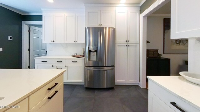 401 Log Tavern Rd, Milford, PA 18337 - kitchen with stainless steel fridge with ice dispenser, light countertops, crown molding, white cabinetry, and recessed lighting