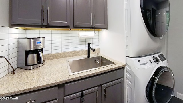 401 Log Tavern Rd, Milford, PA 18337 - washroom with stacked washing machine and dryer and cabinet space