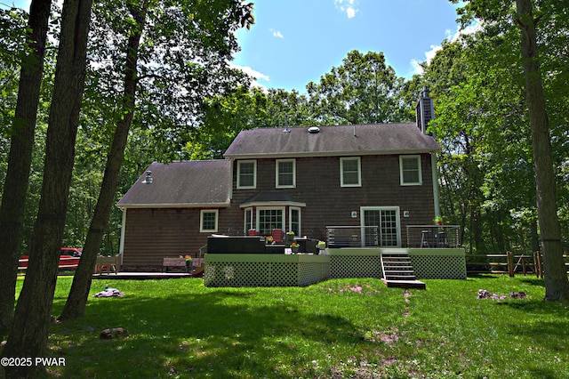 401 Log Tavern Rd, Milford, PA 18337 - rear view of house featuring a deck, a chimney, a lawn, and a shingled roof